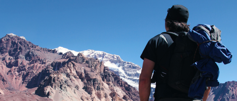 Manlooking at the Aconcagua summit, Highest peak of all Americas