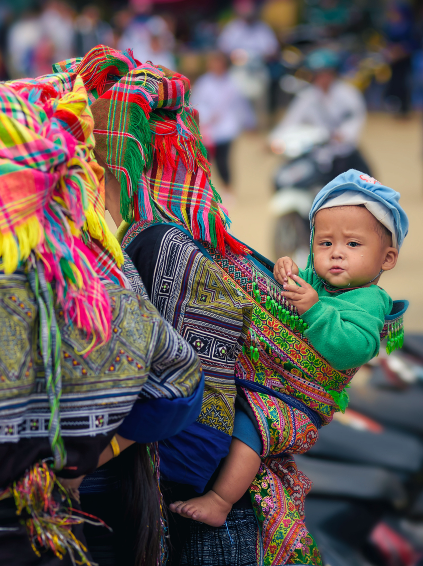 Hilltribe children in basket on mother vietnamese
