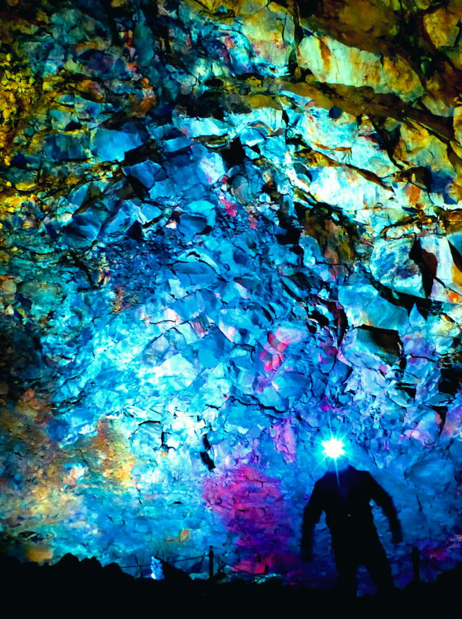 Inside the Volcano: Colorful magmatic stones (Mid Ocean Ridge Basalt) iluminated by artificial light inside the dead volcano "Thrihnukagigur" in Iceland (May 2015)