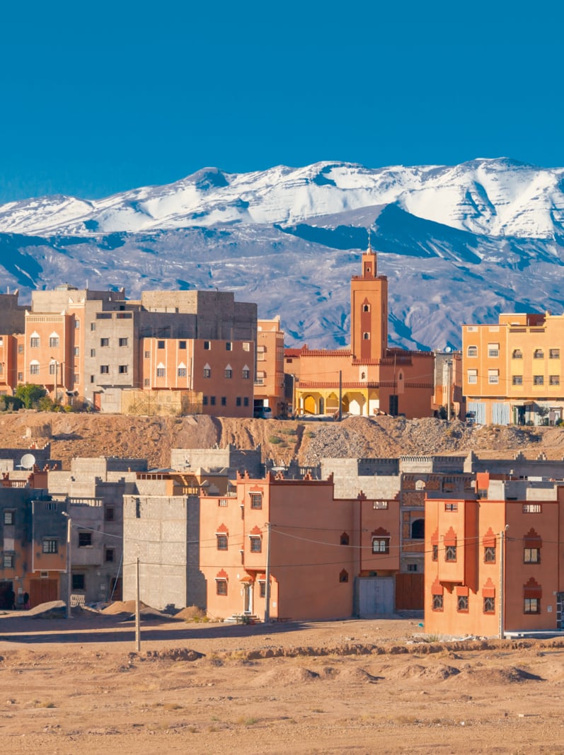 Ouarzazate city and High Atlas Mountains aerial panoramic view, Morocco