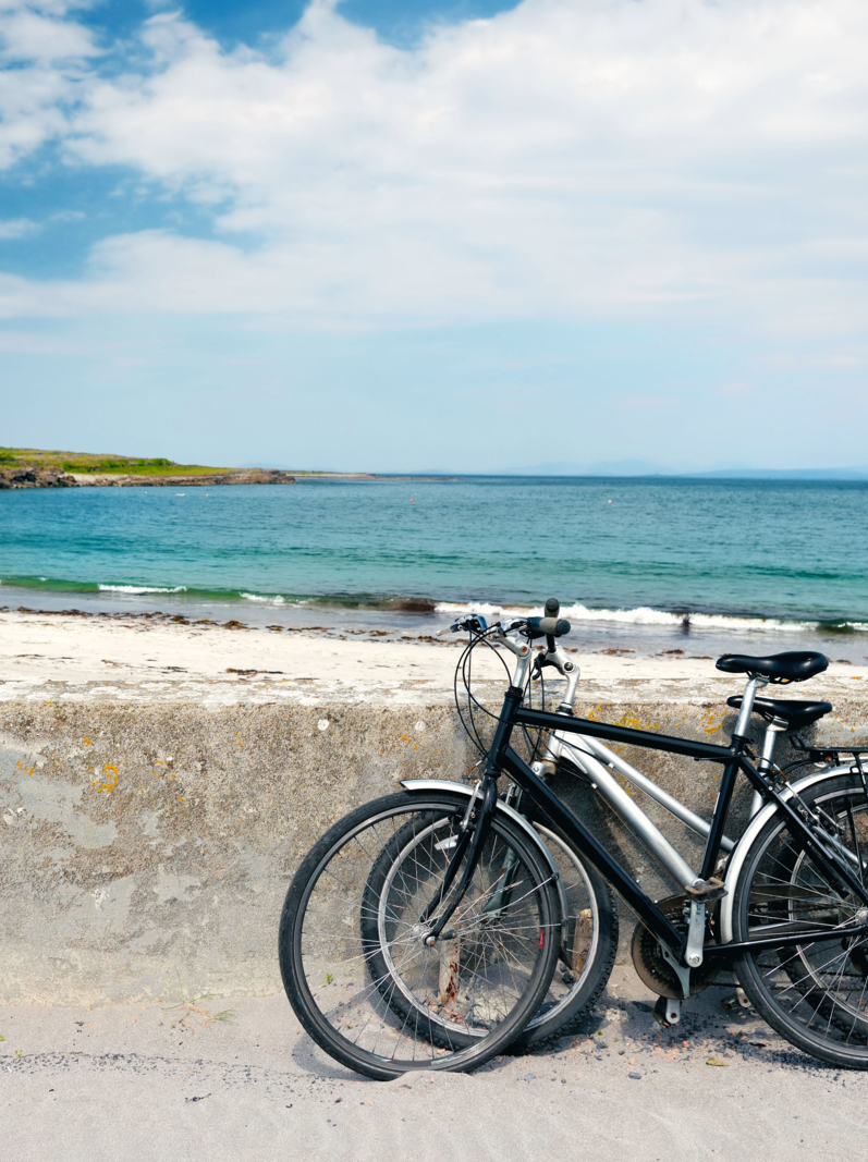 Two bikes near sandy beach on Inishmore, the largest of the Aran Islands in Galway Bay, Ireland