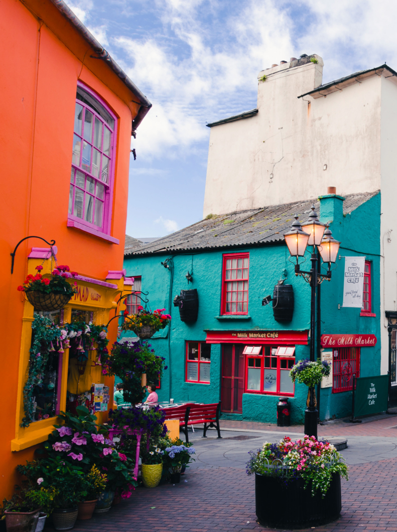 square of a small irish village with houses and shops full of colors, kinsale, cork county, Ireland