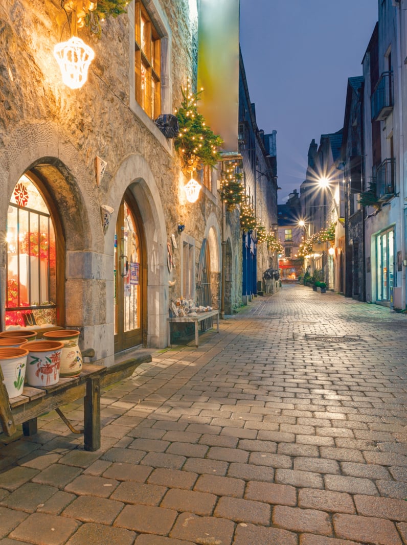 Old street in Galway, Kerwan's Lane, decorated with christmas lights, night scene