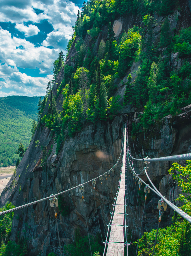 Suspension bridge. Via ferrata in Canada. Adrenalin way. View to the valley