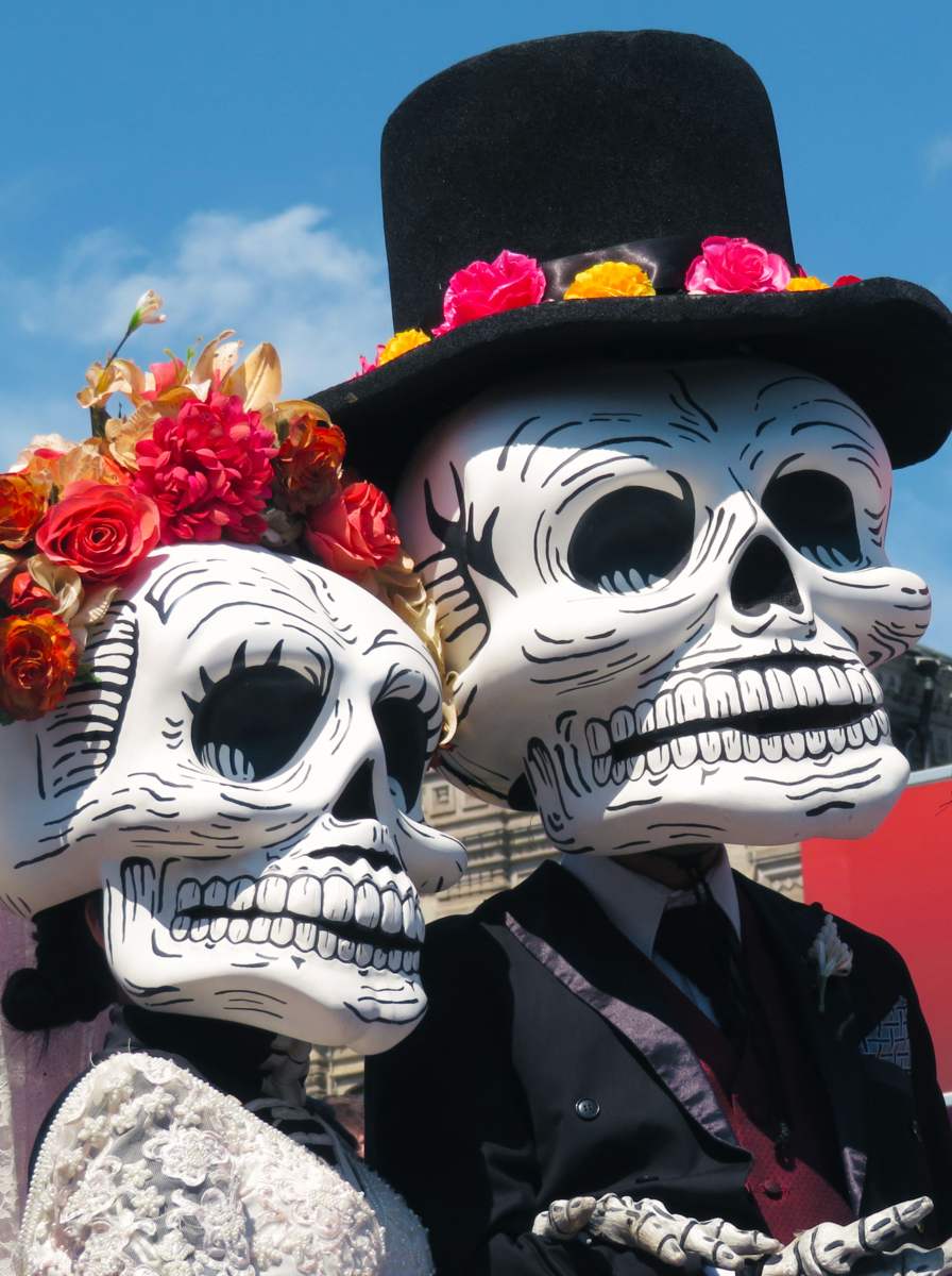 Participants of the Mexican holiday in death masks