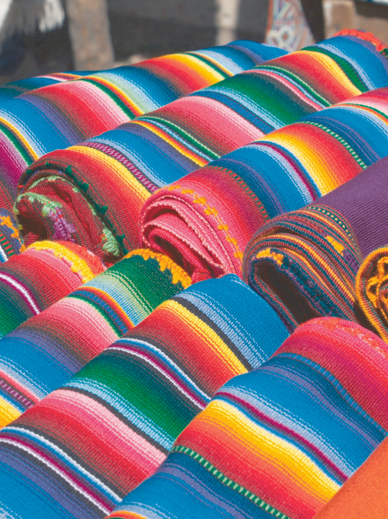 Colorful Mexican blankets for sale at market