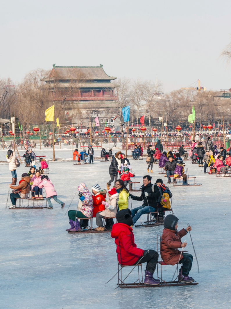 People have a fun with the sledge during the winter time, BeijingPeople have a fun with the sledge during the winter time, Beijing