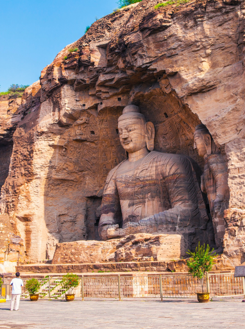 Yungang Grottoes. World cultural heritage. One of China's four most famous "Buddhist Caves Art Treasure Houses", is located Datong, Shanxi Province. It is cave 20. Buddha is 13.7 metres high