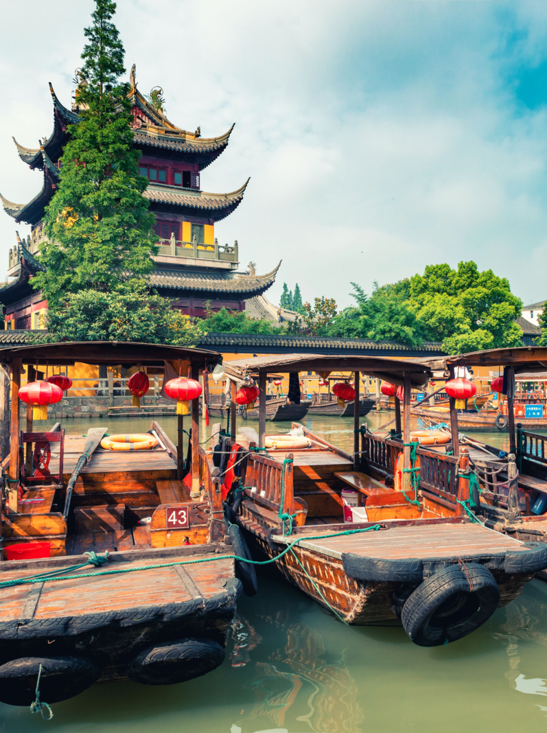 China traditional tourist boats on canals of Shanghai Zhujiajiao Water Town in Shanghai, China