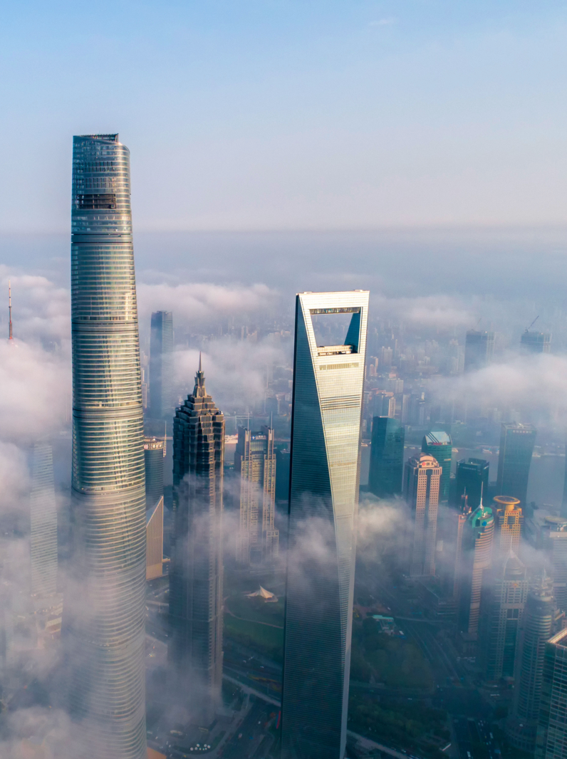 the skyscrapers in Shanghai Lujiazui above the advection fog at sunrise