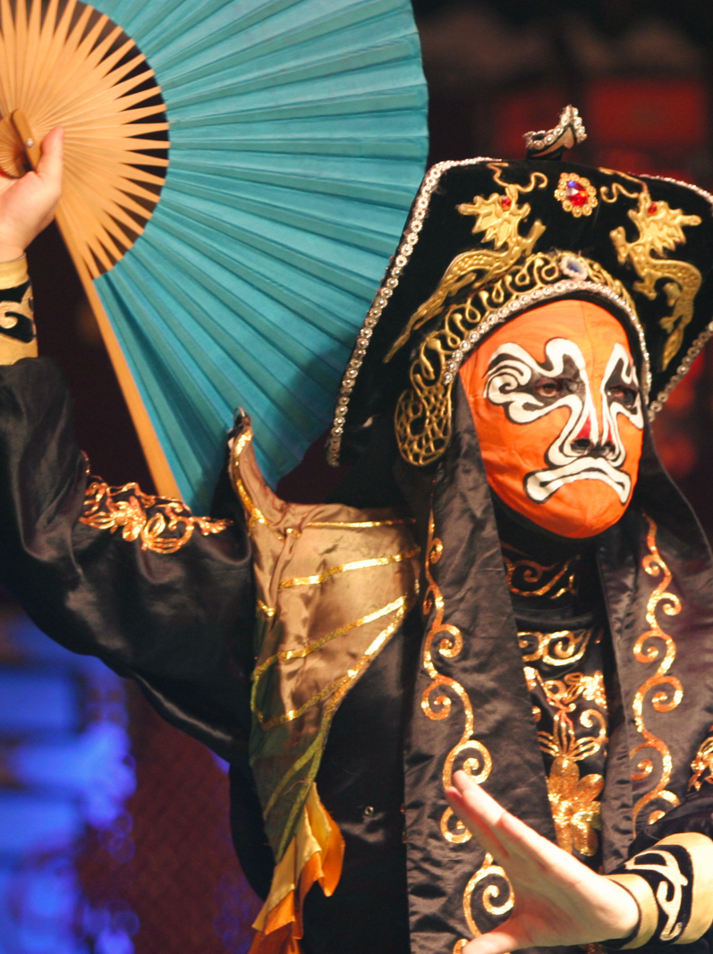 Traditional Chinese Opera masked actor. Shot this at a Chinese Opera in Chengdu, China.