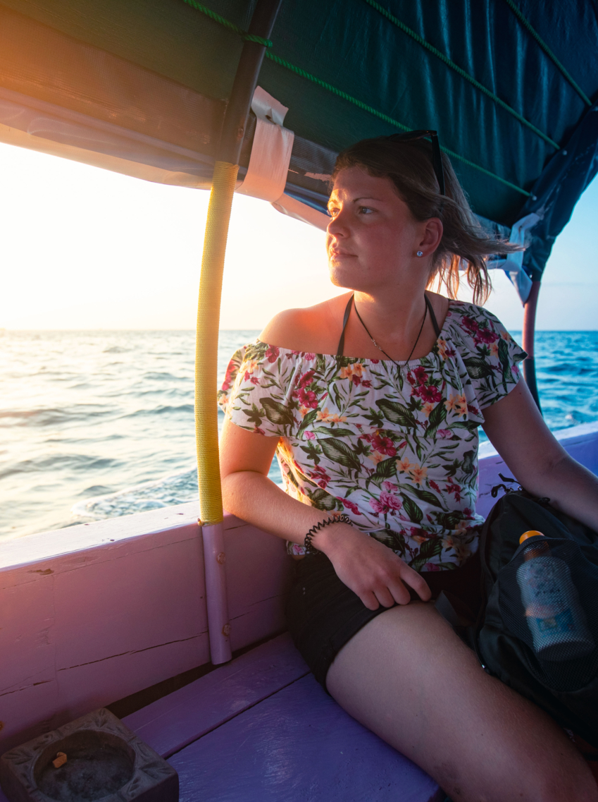 Young Woman Enjoying Traveling on Boat.