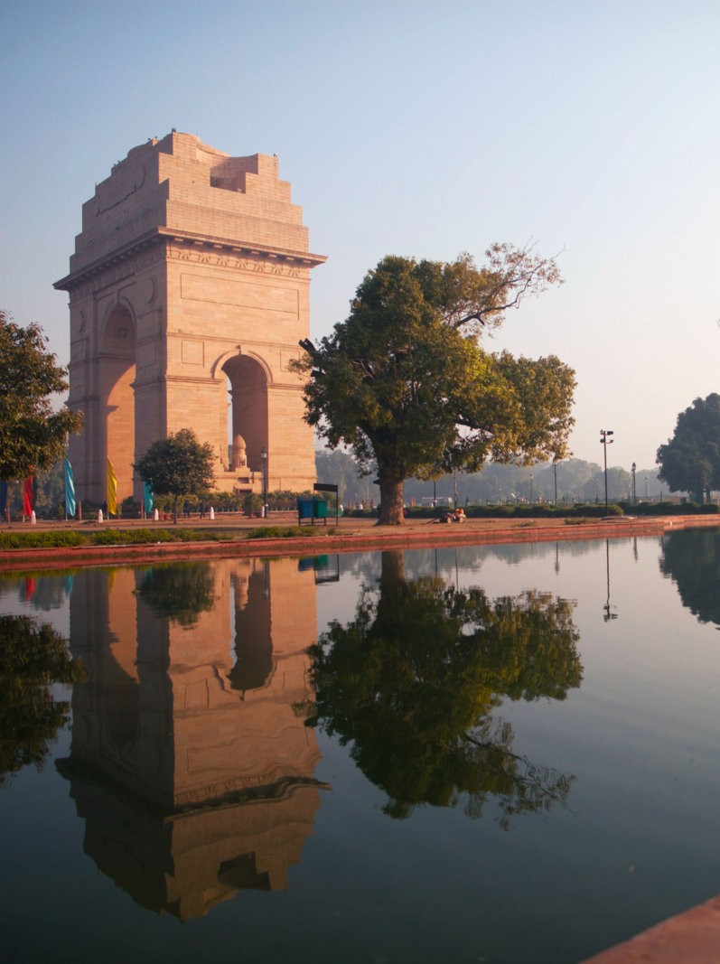 Sunrise at India Gate, which is the national monument of India and was designed by Sir Edwin Lutyens. This famous famous landmark in Delhi commemorates the 90,000 soldiers of the British Indian Army who lost their lives while fighting for the British Indian Empire, or more correctly the British Raj in World War I and the Third Anglo-Afghan War. It is composed of red sand stone and granite