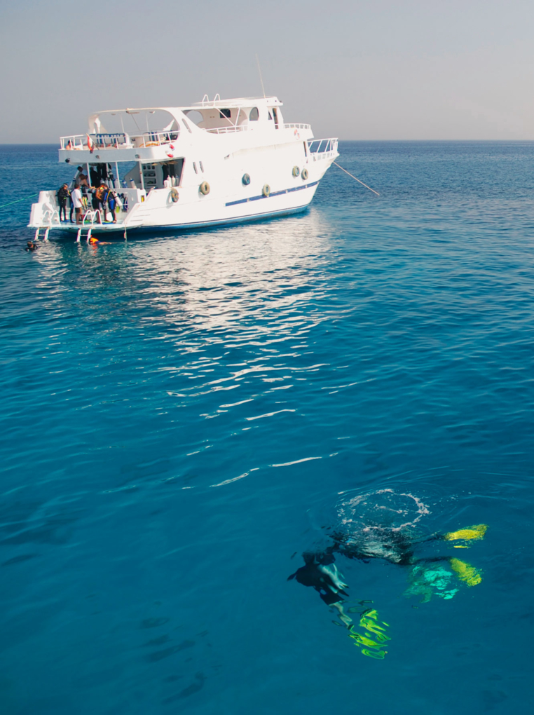Divers and boat in the Red Sea