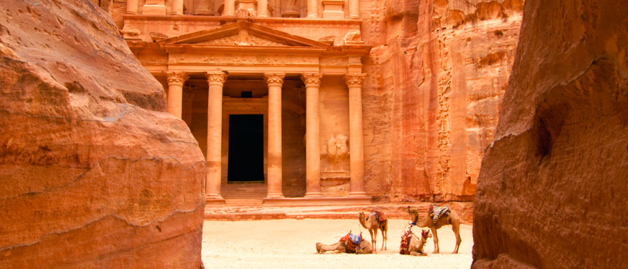 Camels outside the Treasury at Petra in Jordan - city carved out of the rock