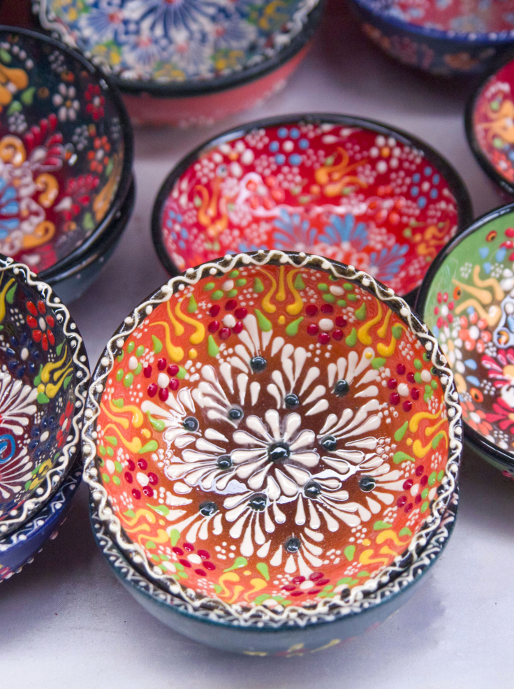 Colorful handmade bowls wtih floral ornaments Petra, Jordan