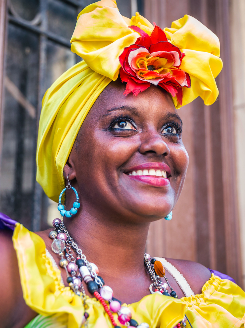 Portrait of african cuban woman looking at camera smiling